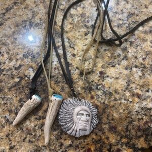 Bone pendant necklaces on leather
